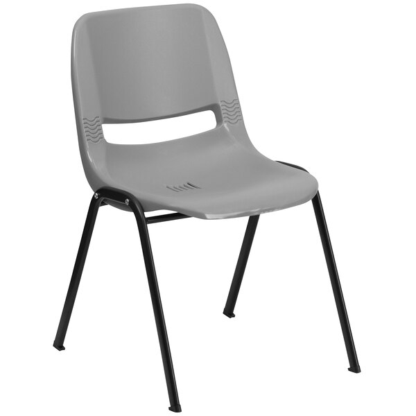 A gray Flash Furniture plastic chair with black legs.
