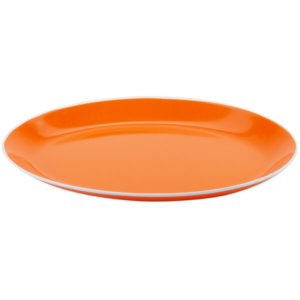 A tangerine orange melamine oval platter with a white trim.