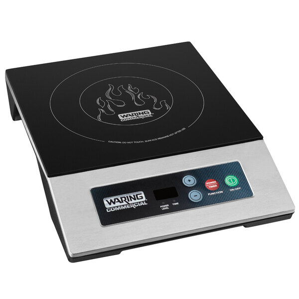 A black and silver Waring induction range on a countertop.