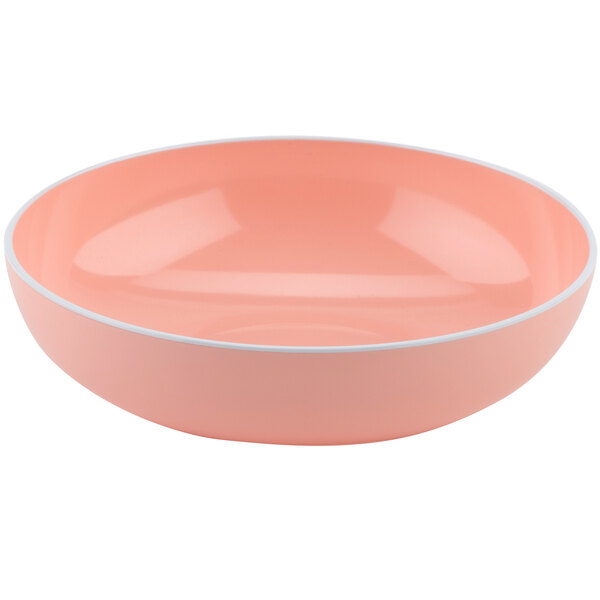 A pink bowl with a white rim.