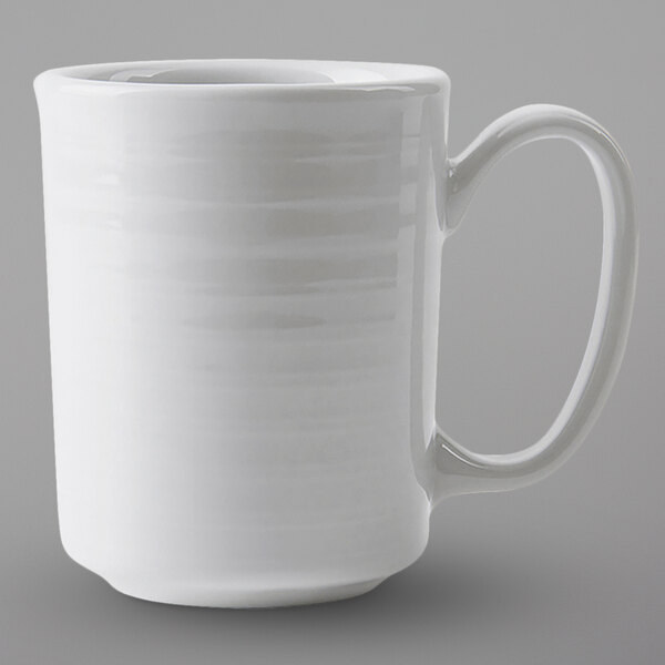 A Tuxton bright white china mug with a large handle.