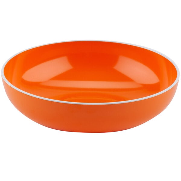 A tangerine orange melamine serving bowl with white trim.