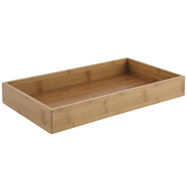 A rectangular wooden underliner for a Bon Chef cold wave platter.