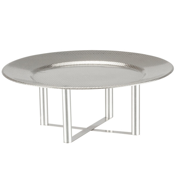 A round silver tray with a metal base and legs.