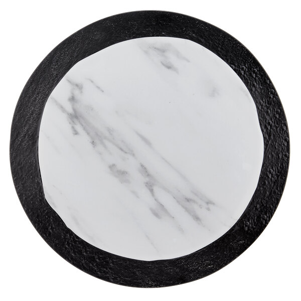 An American Metalcraft white marble serving platter with black and white lines.