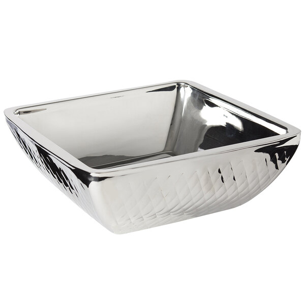 A silver square Bon Chef bowl with a pattern on the walls.