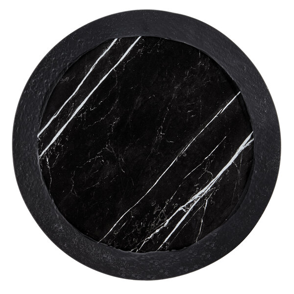 A black and white marble serving platter with white stripes.