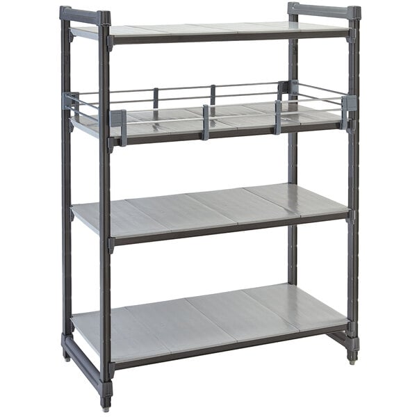 A grey metal Cambro Elements shelf rail kit installed in a room with three grey metal shelves.