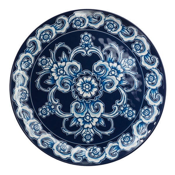 An American Metalcraft Isabella melamine plate with a blue and white floral design.