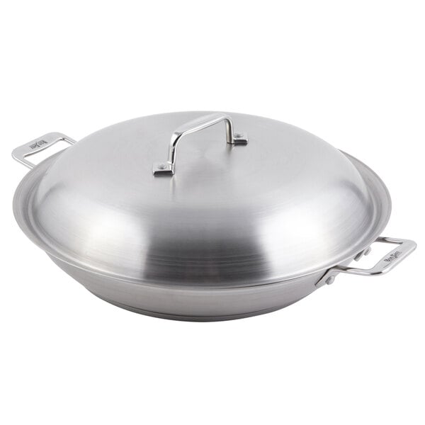 A Bon Chef stainless steel brazier pan with a lid.
