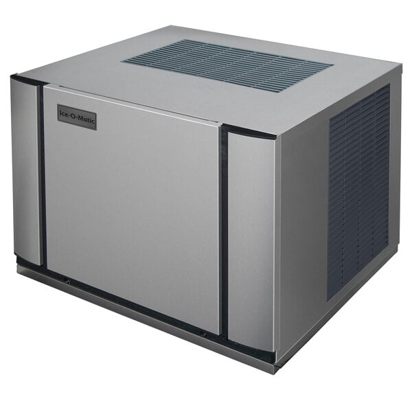 A white Ice-O-Matic water cooled ice machine with a rectangular vent.