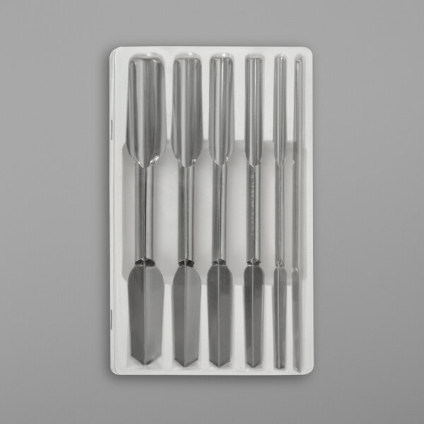 A set of six stainless steel Thunder Group garnishing tools in a white box.
