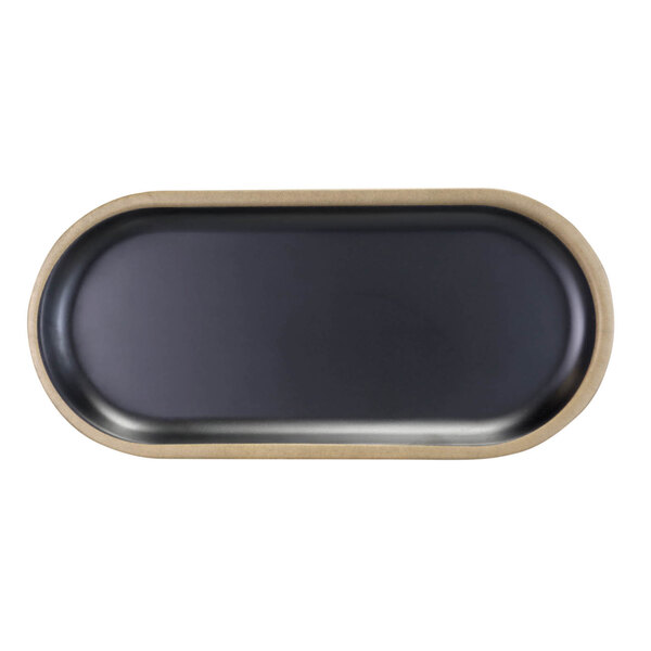 A black oval Elite Global Solutions melamine plate with a gold edge.