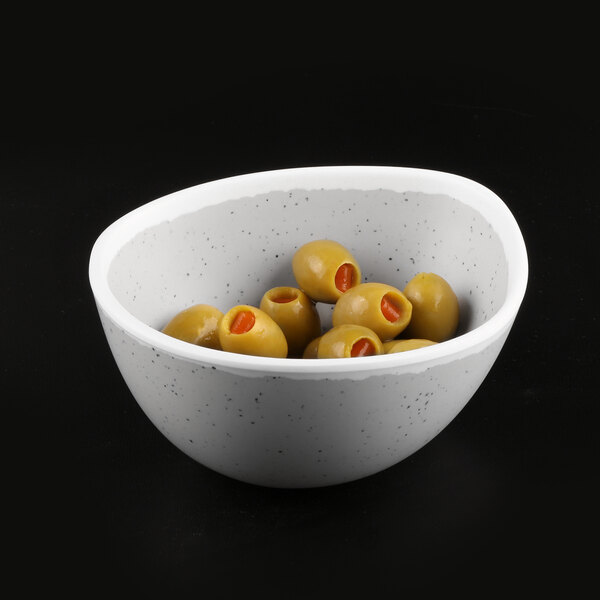 An Elite Global Solutions gray speckle melamine bowl filled with green olives.