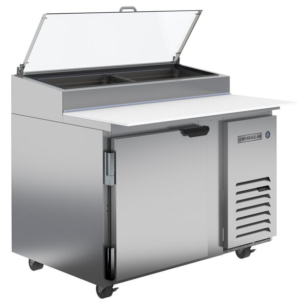 A Beverage-Air stainless steel refrigerated pizza prep table with a clear glass lid.