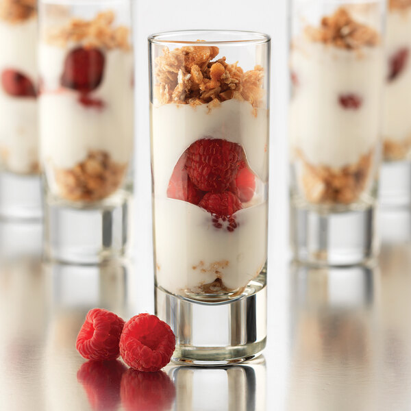 A Libbey cordial glass filled with a raspberry yogurt parfait.