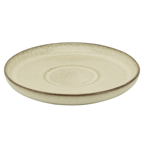 A white plate with a circular shape and a brown rim.