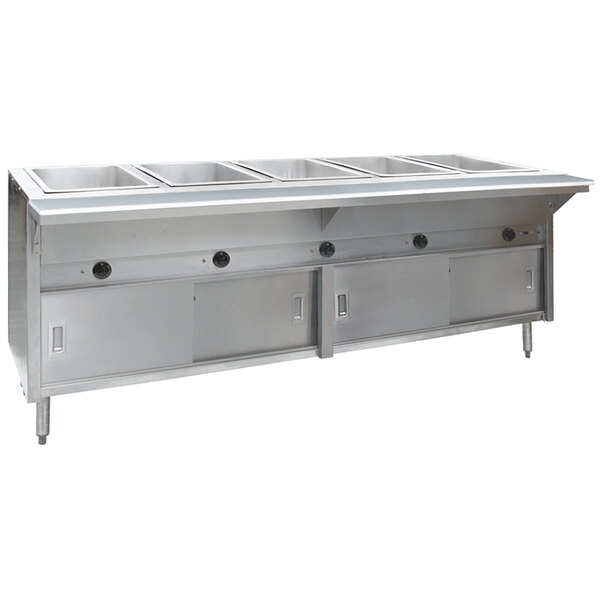 A stainless steel Eagle Group hot food table with sliding doors on a counter in a commercial kitchen.
