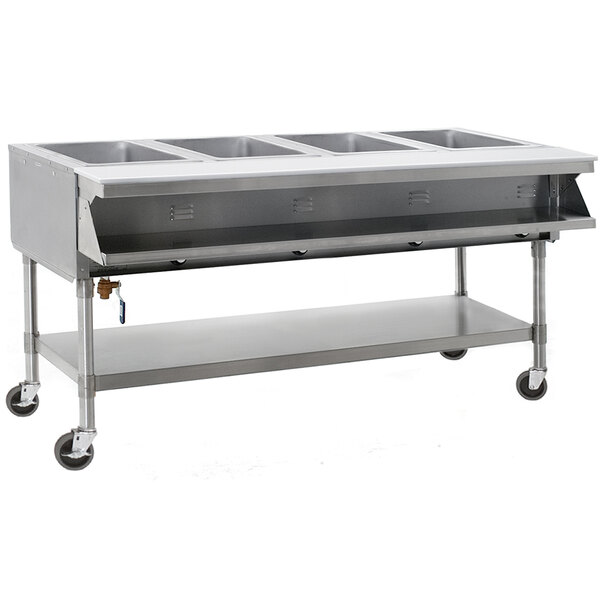 A stainless steel Eagle Group hot food table with three sealed wells on a counter.