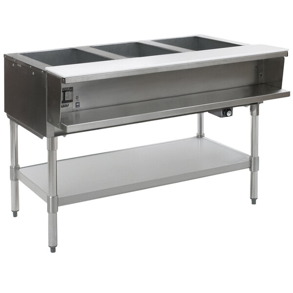 A stainless steel Eagle Group water bath steam table with three wells on a stainless steel counter.