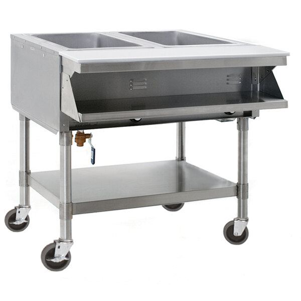 A stainless steel Eagle Group commercial hot food table on wheels.