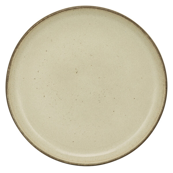 A 10 Strawberry Street beige porcelain coupe bread and butter plate with a brown rim.