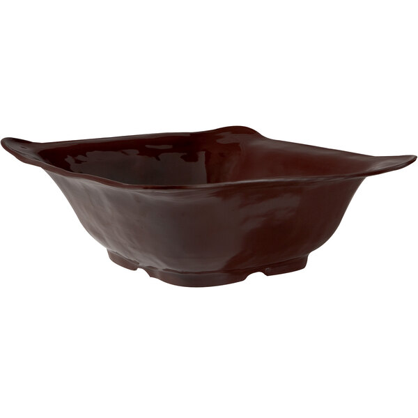 A brown GET New Yorker square bowl with a curved edge.
