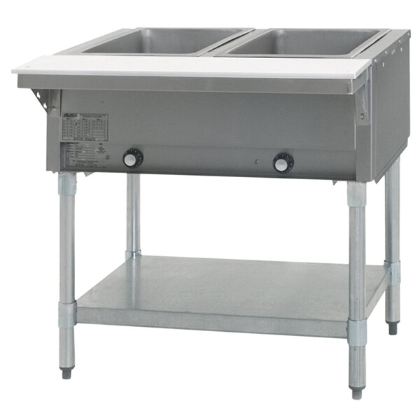 An Eagle Group commercial hot food table with two open wells on a galvanized base.
