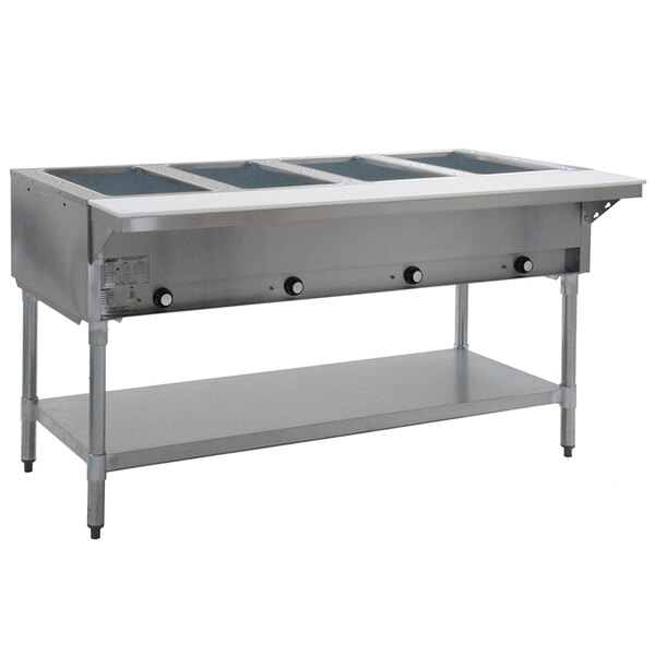 A large stainless steel Eagle Group hot food table with four pans.