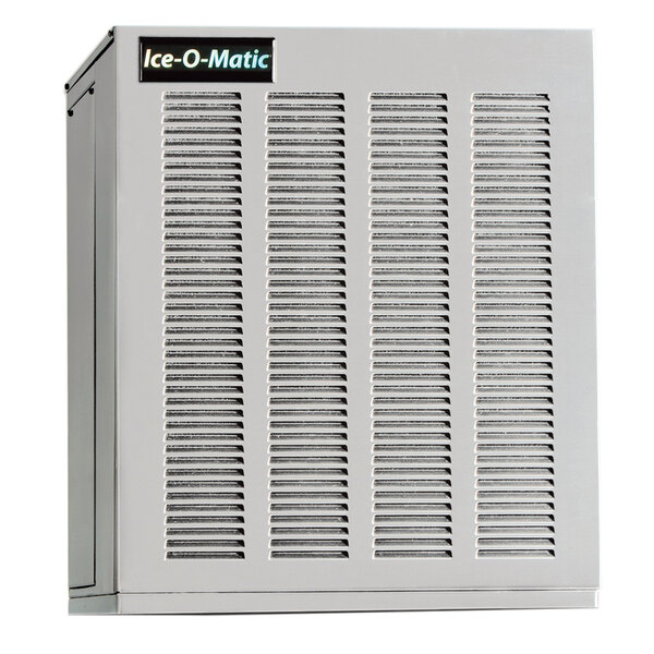 A white Ice-O-Matic remote cooled flake ice machine with vents.