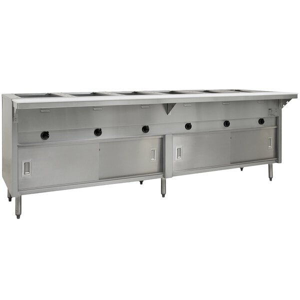 A stainless steel Eagle Group Spec Master hot food table with sliding doors on a counter in a large kitchen.