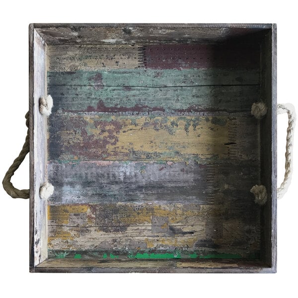 A reclaimed wood square serving tray with rope handles.