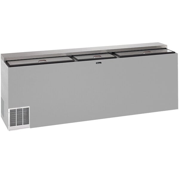 A Perlick stainless steel horizontal flat top bottle cooler with two doors.