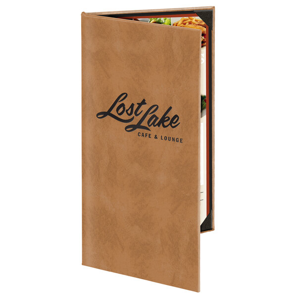 A brown leather Menu Solutions Kensington menu cover with customizable inserts on a table in an Asian cuisine restaurant.
