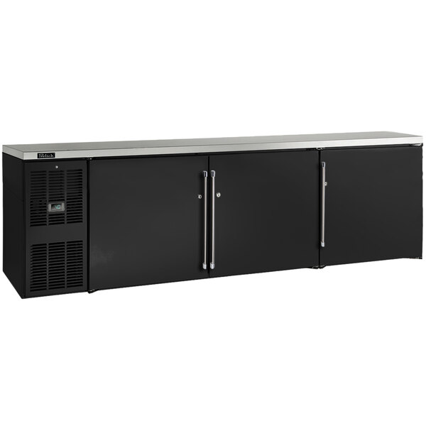A black Perlick back bar refrigerator with two doors and two drawers.