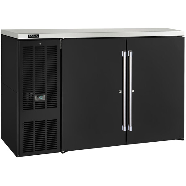 A black Perlick back bar refrigerator with two narrow doors.