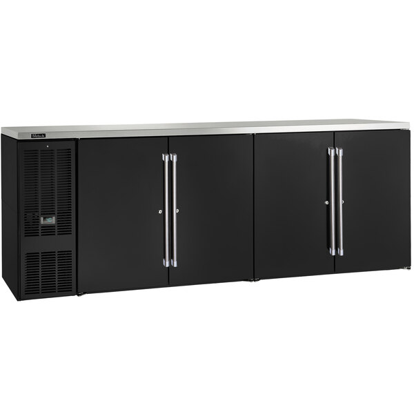 A black Perlick back bar refrigerator with silver handles.