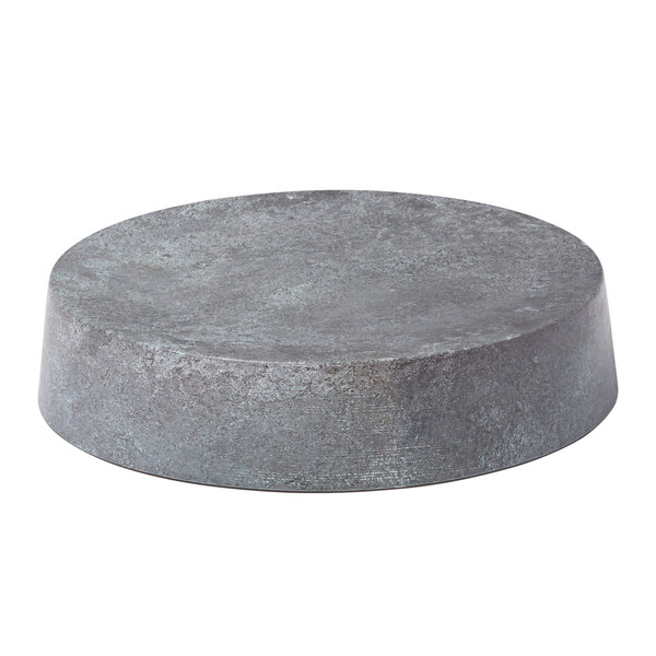 An American Metalcraft faux greystone round melamine riser with a grey surface.