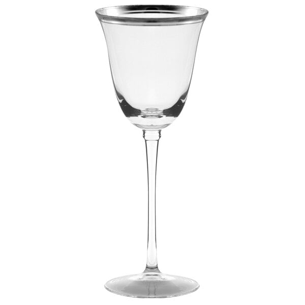 A 10 Strawberry Street Windsor wine glass with a silver rim and long stem.