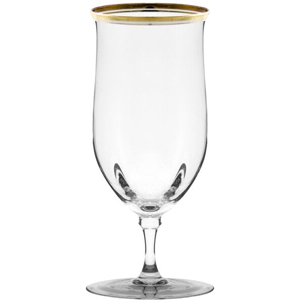 A close-up of a 10 Strawberry Street Windsor clear wine glass with a gold rim.
