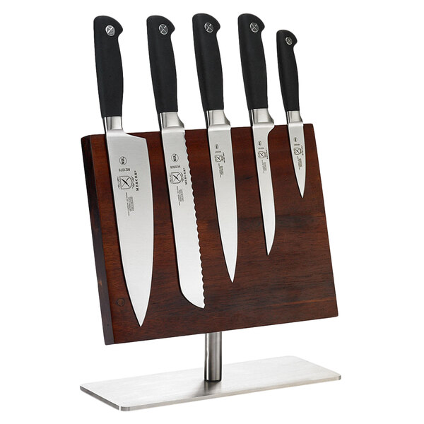 A Mercer Culinary Genesis 6-piece knife set on a wooden stand.