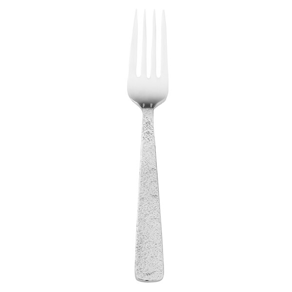 A silver Walco Vestige salad fork with a white background.