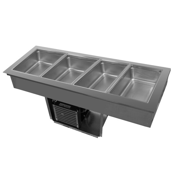 A Delfield stainless steel drop-in refrigerated cold food well with four compartments.