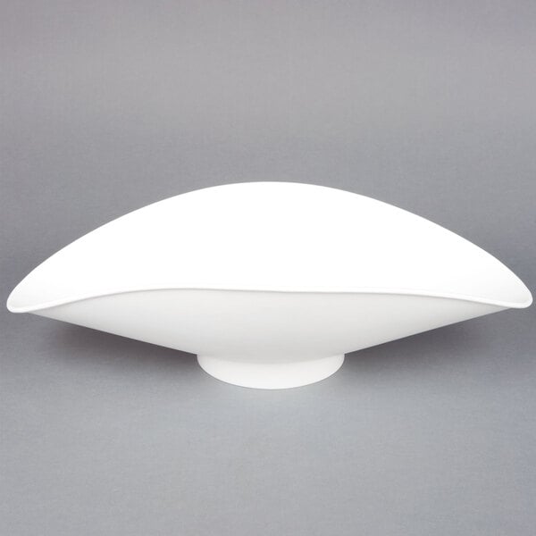 An Edlund white plastic oval shaped scale scoop.