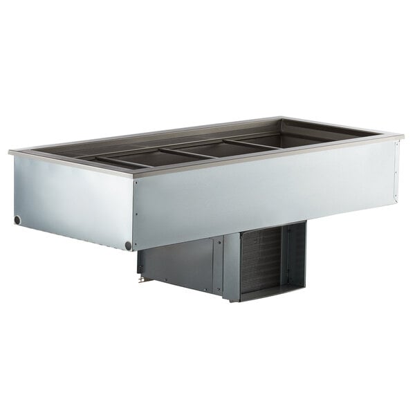 A Delfield drop-in refrigerated cold food well with four large stainless steel containers inside.