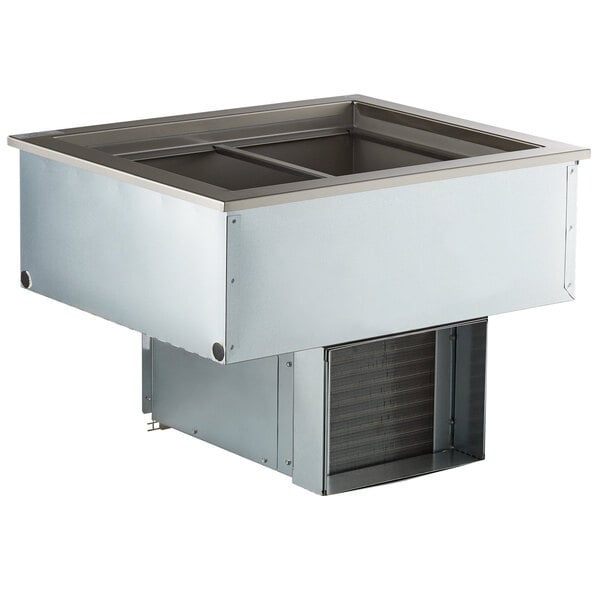 A Delfield stainless steel drop-in refrigerated cold food well with two pans inside.