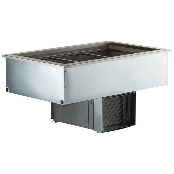 A Delfield drop-in refrigerated cold food well with three large stainless steel containers.