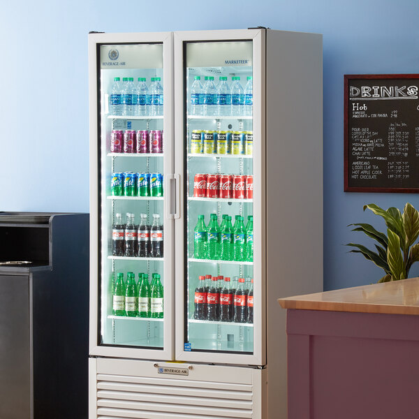 A Beverage-Air Marketeer series glass door refrigerator filled with drinks.