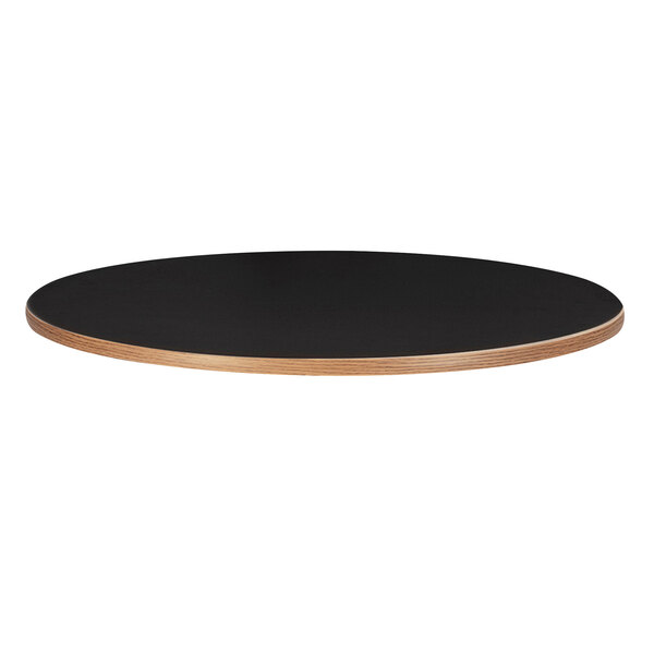 A black table top with a wooden edge.