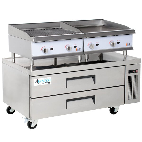 A large stainless steel Cooking Performance Group gas griddle and radiant charbroiler with a refrigerated chef base with two drawers.